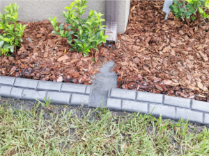 Example of how landscape curbs work with gutters